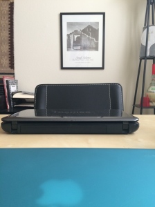 Take a seat and look across the desk I share with my husband, dashing Dave. I love looking over my cool blue MacBook cover to the masculine blacks and neutral tones.