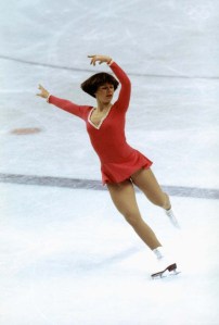 INNSBRUCK, AUS - 1976: Dorothy Hamill skates on right skate with both arms posed above her head and left leg back during the Winter Olympics skating competition in 1976 in Innsbruck, Austria. Dorothy Hamill wins the gold medel for the USA in the Womes Figure skating competition. (Photo by Tony Duffy/Getty Images) *** Local Caption *** Dorothy Hamill